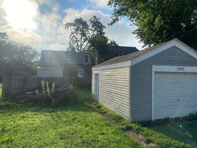 garage with a yard