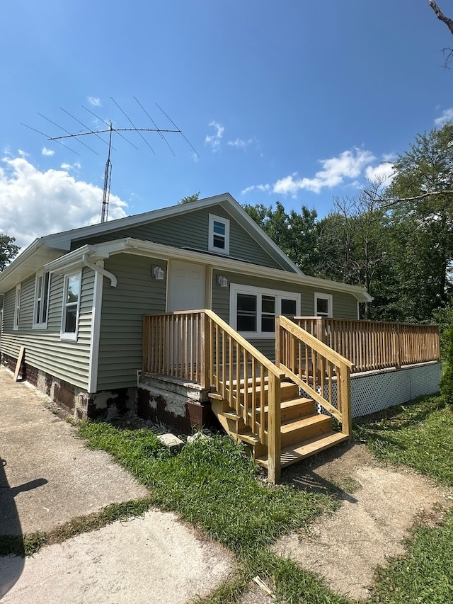 view of front of house with a deck