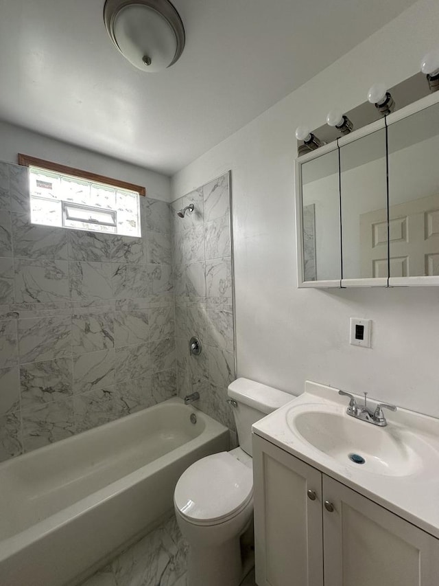 705 N Cottage Ave, Kankakee, IL 60901 - bathroom featuring bathing tub / shower combination, vanity, and marble finish flooring