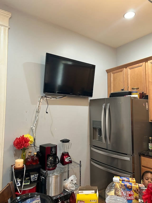 kitchen with stainless steel fridge