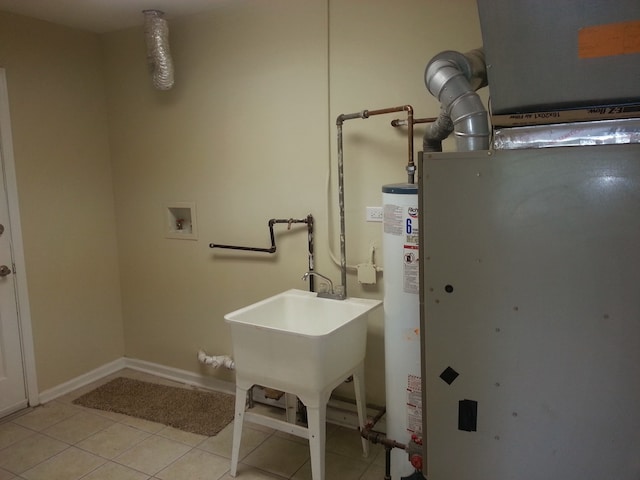 utility room featuring gas water heater