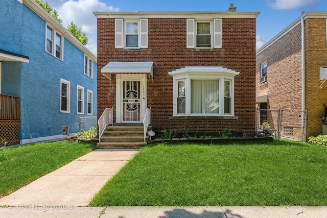 view of front of home featuring a front yard