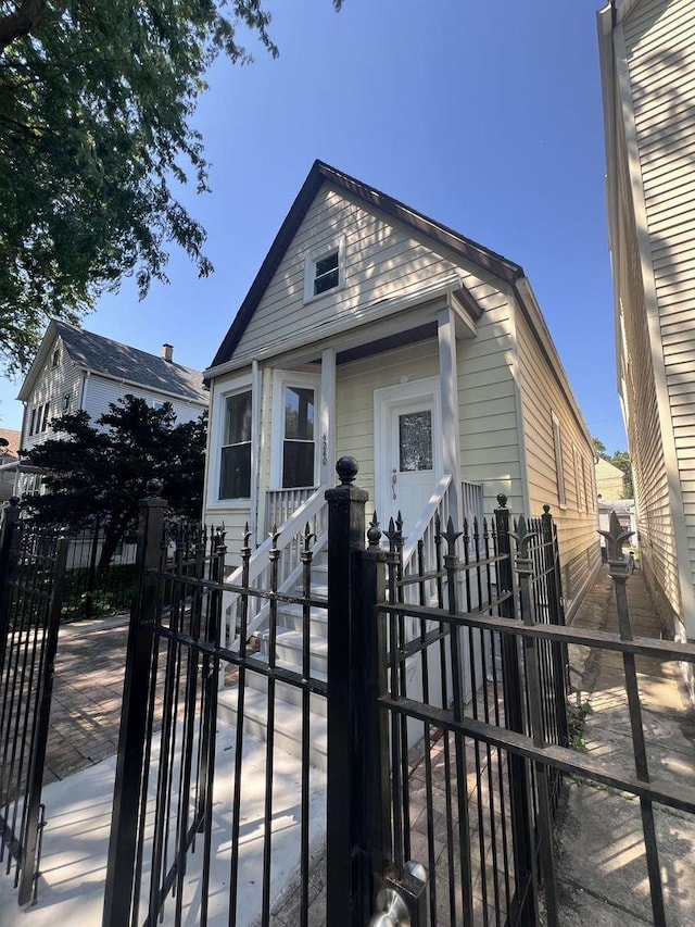 view of front of house with fence