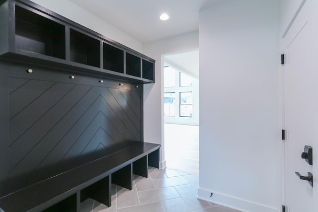 mudroom with recessed lighting and light tile patterned floors