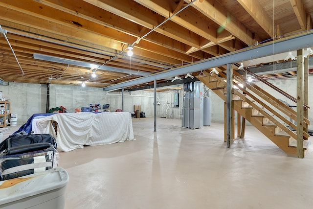 basement featuring heating unit and gas water heater