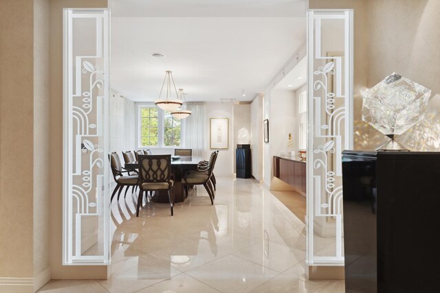 dining room with light tile patterned floors