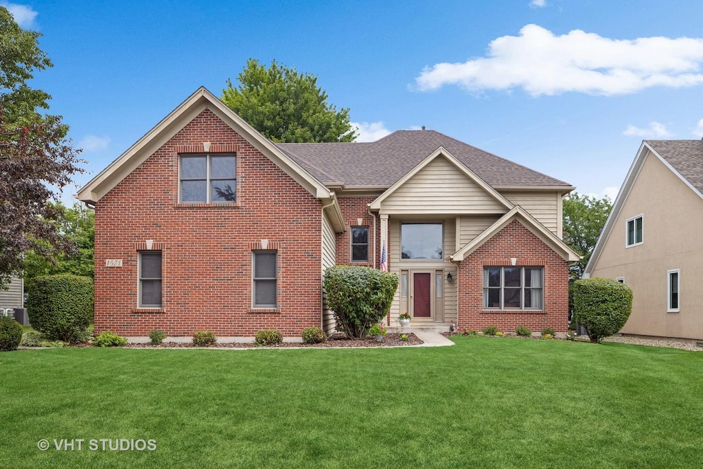 view of front property with a front lawn