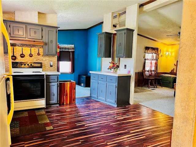 kitchen with a textured ceiling, ornamental molding, dark hardwood / wood-style flooring, range with electric cooktop, and backsplash