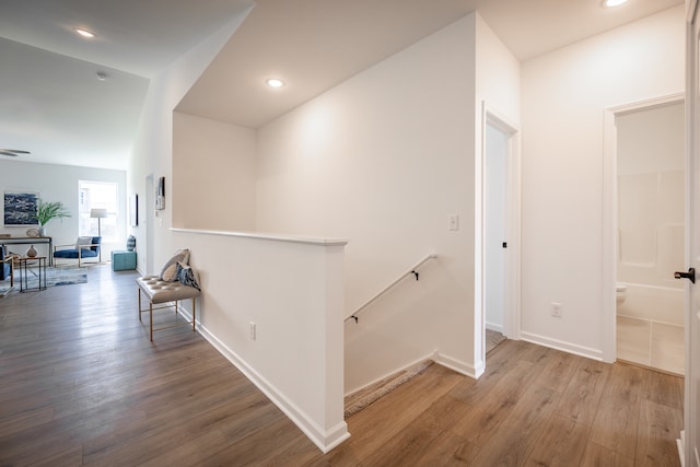 hallway featuring wood-type flooring