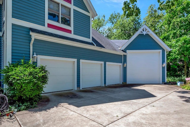 garage featuring driveway