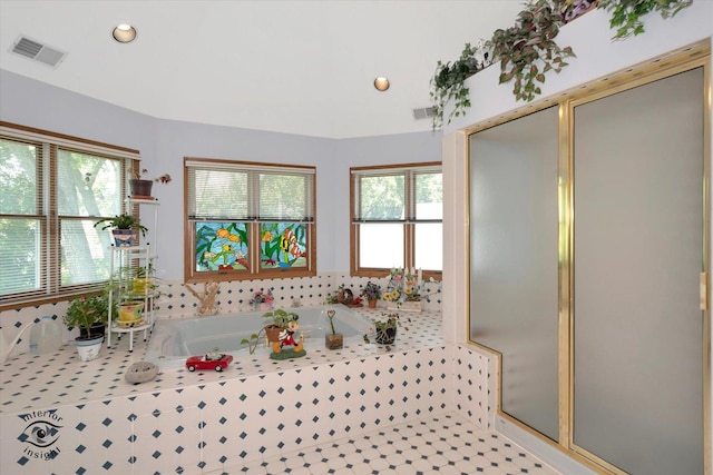 interior space with visible vents, light countertops, and recessed lighting