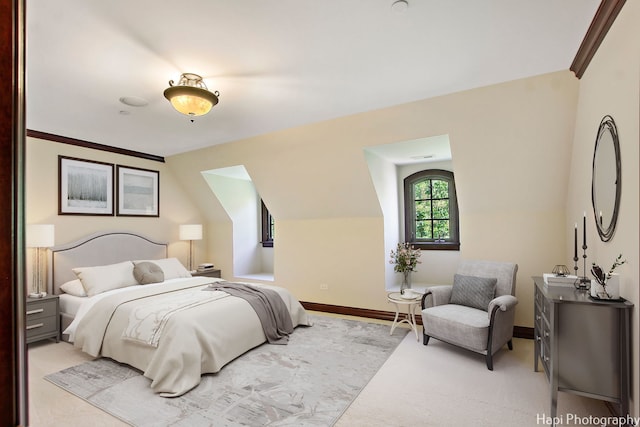 carpeted bedroom with vaulted ceiling