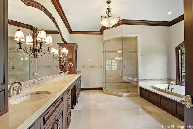 bathroom featuring tile patterned flooring, crown molding, separate shower and tub, and vanity