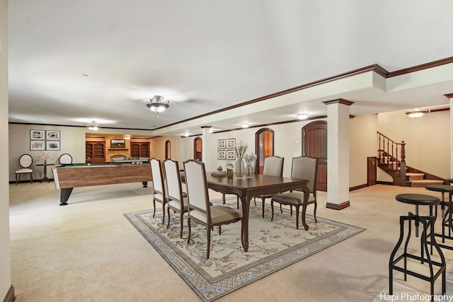 carpeted dining area featuring billiards and ornamental molding