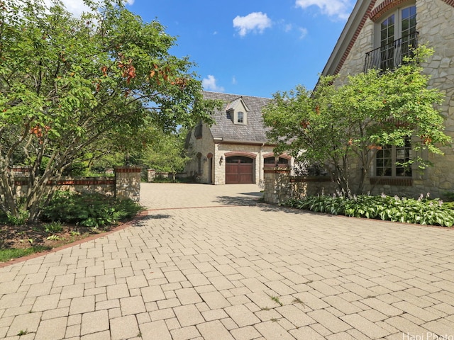 view of front of property with a garage