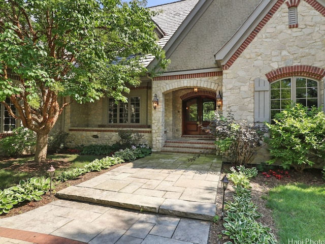 property entrance featuring french doors