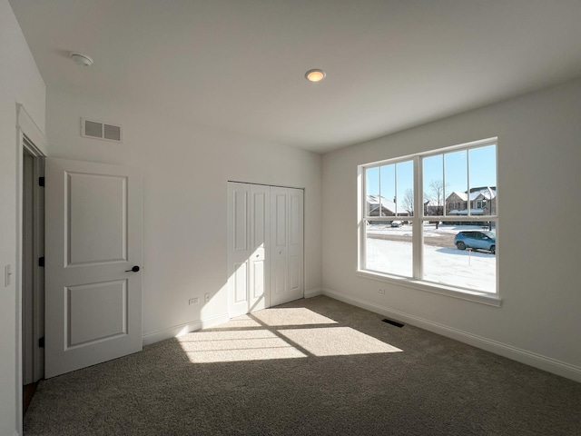 view of carpeted spare room