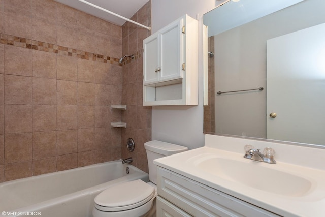 bathroom with vanity, shower / tub combination, and toilet