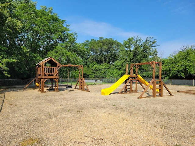 view of jungle gym with fence