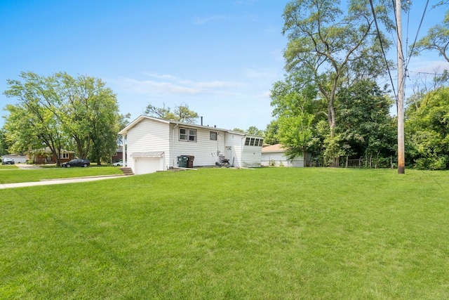 view of yard featuring a garage