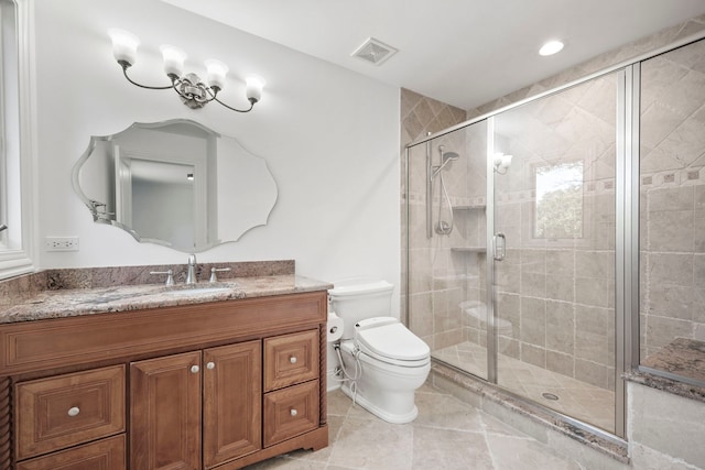 bathroom featuring a stall shower, visible vents, toilet, tile patterned flooring, and vanity