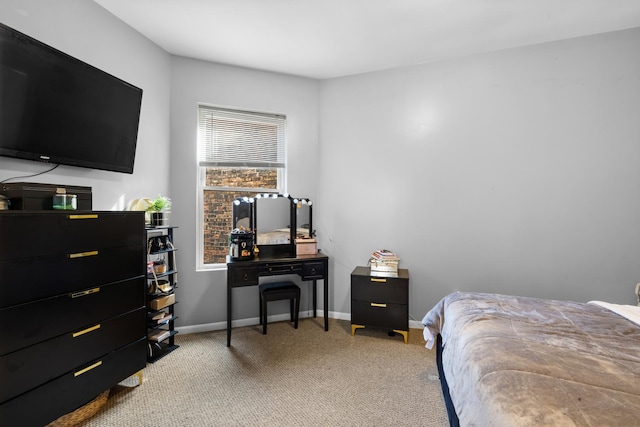 bedroom featuring light carpet