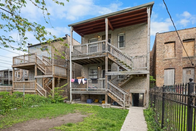 rear view of house with a deck