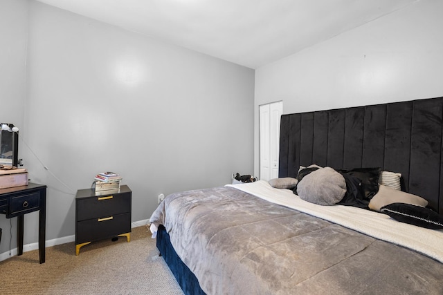 bedroom with light colored carpet