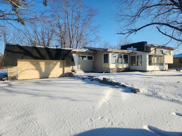 view of front of property with a garage