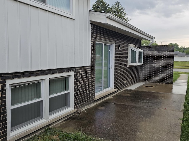 view of home's exterior with a patio area