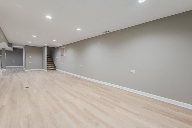 unfurnished living room featuring light wood-type flooring