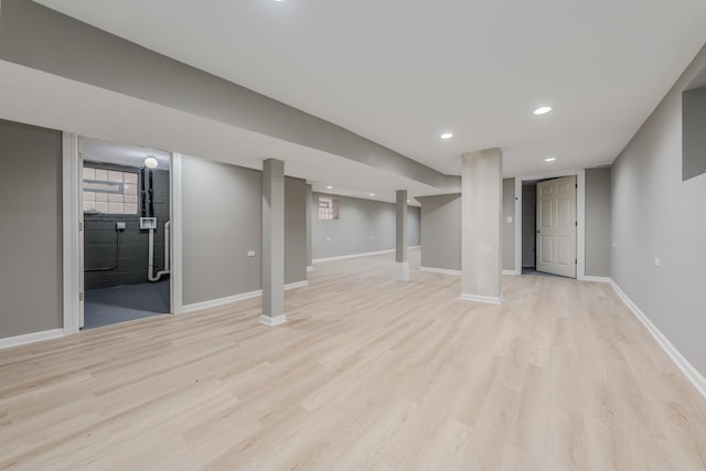 basement featuring light hardwood / wood-style floors