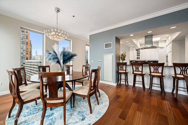 1250 S Michigan Ave Unit 2900, Chicago, IL 60605 - dining space with ornamental molding, dark wood-style flooring, visible vents, and baseboards