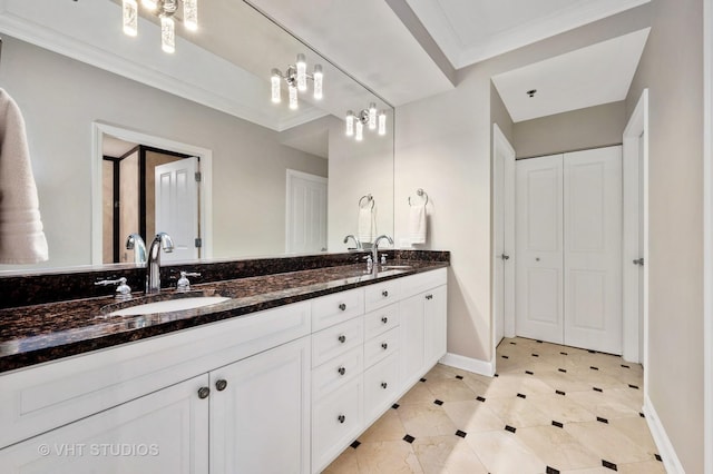 1250 S Michigan Ave Unit 2900, Chicago, IL 60605 - bathroom featuring double vanity, baseboards, ornamental molding, and a sink