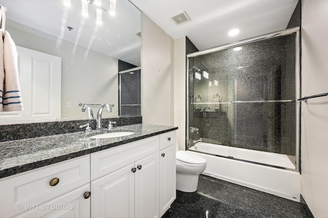1250 S Michigan Ave Unit 2900, Chicago, IL 60605 - full bathroom featuring visible vents, granite finish floor, toilet, enclosed tub / shower combo, and vanity