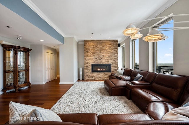 1250 S Michigan Ave Unit 2900, Chicago, IL 60605 - living area featuring baseboards, ornamental molding, wood finished floors, and a stone fireplace