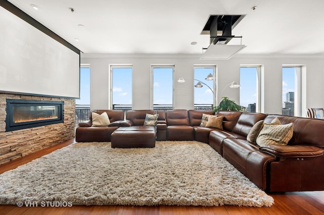 1250 S Michigan Ave Unit 2900, Chicago, IL 60605 - living room with ornamental molding, plenty of natural light, a fireplace, and wood finished floors