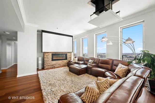 1250 S Michigan Ave Unit 2900, Chicago, IL 60605 - home theater room with dark wood-style floors, ornamental molding, a fireplace, and baseboards