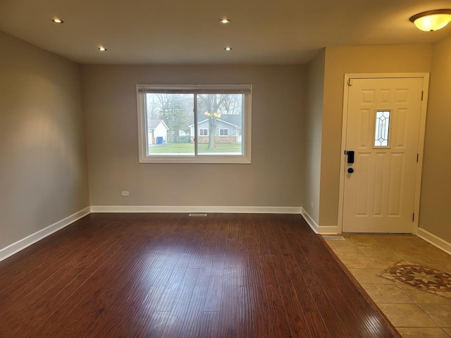 entrance foyer with hardwood / wood-style floors