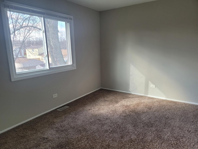 view of carpeted spare room