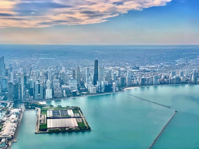 aerial view at dusk with a water view