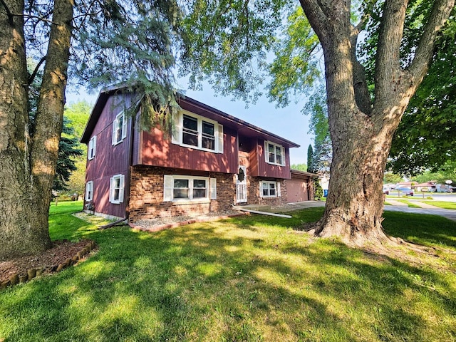 bi-level home with a front yard