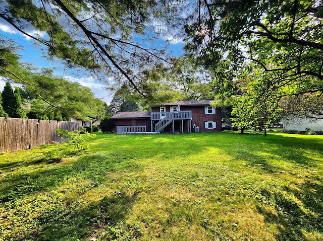 view of yard with a deck