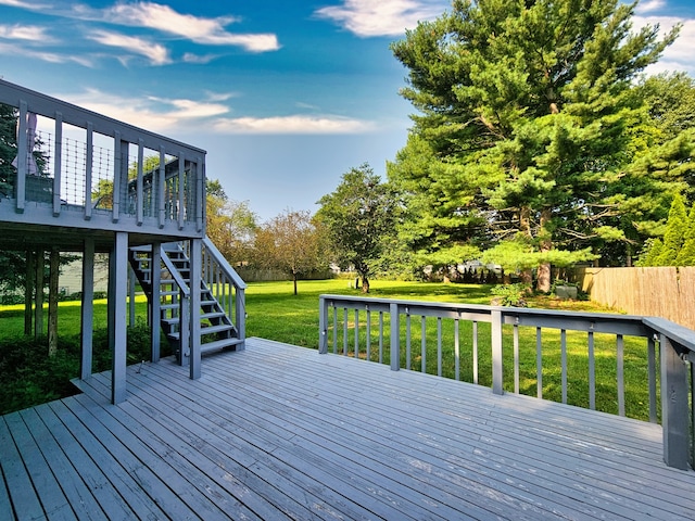 deck featuring a lawn