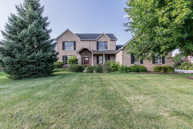 view of front of property featuring a front yard