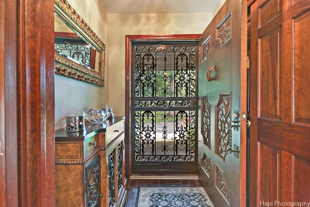 view of tiled foyer entrance