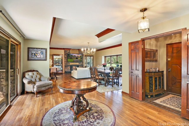 interior space featuring hardwood / wood-style flooring and a chandelier