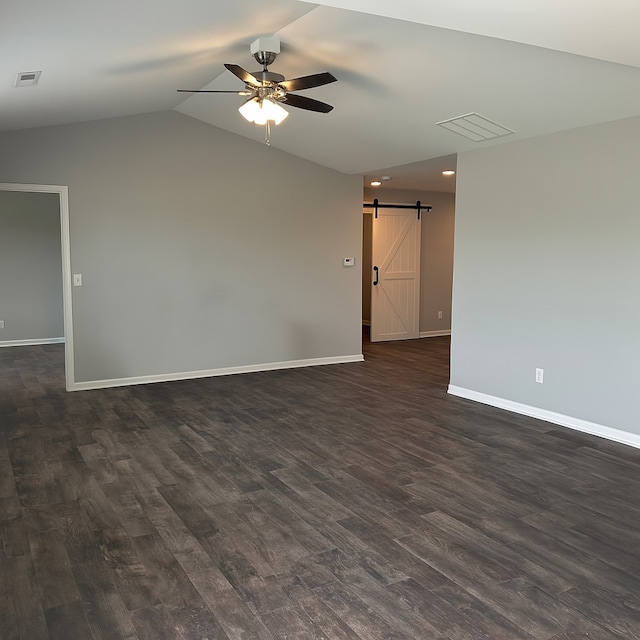 1109 S 2nd St, Oregon, IL 61061 - unfurnished room with a barn door, ceiling fan, lofted ceiling, dark wood-style flooring, and recessed lighting