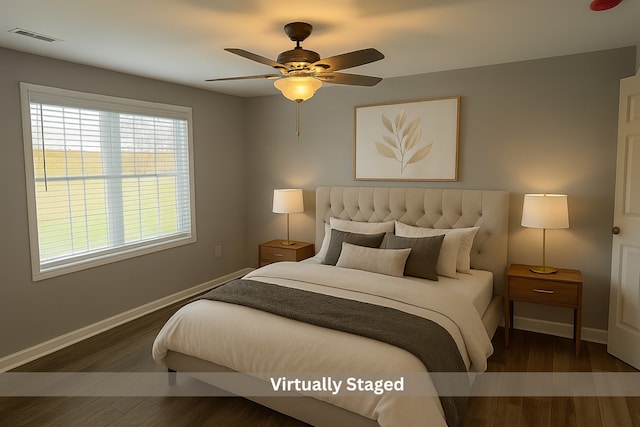 1109 S 2nd St, Oregon, IL 61061 - bedroom with wood finished floors and a ceiling fan