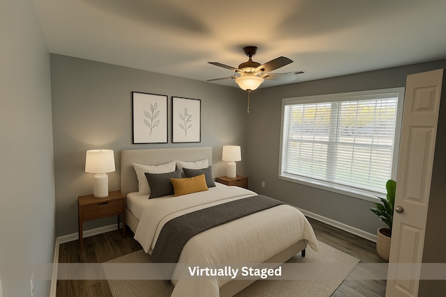 1109 S 2nd St, Oregon, IL 61061 - bedroom with wood finished floors and ceiling fan